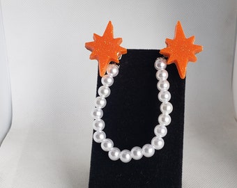 Atomic Star Cardigan Clips in Orange and White