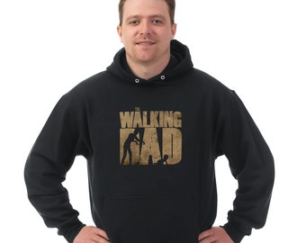 May include: Black hooded sweatshirt with a gold graphic print that says "The Walking Dad" with a silhouette of a zombie and a baby.