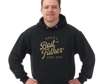 May include: Black hooded sweatshirt with the text "World's Best Father Since 2015" in gold lettering.
