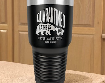 May include: Black stainless steel tumbler with a white design that says "Quarantined Fathers Day" with two bear silhouettes and the text "Kayla Mandy Peter June 21 2020".
