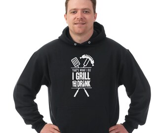 May include: Black hooded sweatshirt with a white graphic that says "That's what I do I grill and drink" with a grill spatula and hot dog crossed over each other.