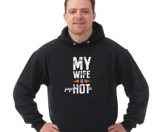 May include: Black hooded sweatshirt with white text that reads "My wife is psycho hot" with a flame graphic.