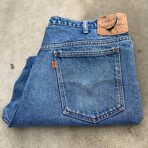 Vintage Levi&#39;s Orange Tab Medium Wash Distressed Denim 38x27 Vintage Levi&#39;s Jeans Made in the USA!