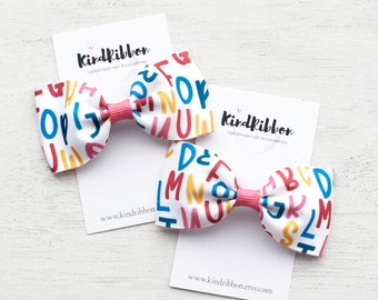 Noeud pour cheveux alphabet - 3 pouces