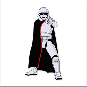 May include: A white Stormtrooper figure with a black cape and red trim, pointing with its right hand. The figure is from the Star Wars franchise.
