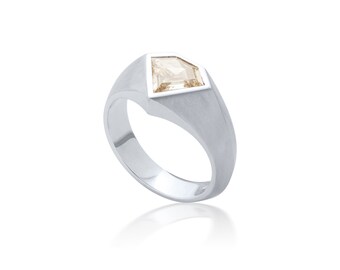 Platinum and diamond superman ring set with 1.16ct Champagne diamond