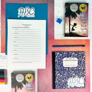 May include: A blue and white composition notebook with a black cover and a sticker that says "ABC Crate". There is a book titled "Inside Out & Back Again" by Thanhha Lai, a blue pencil, and a set of colored pencils.