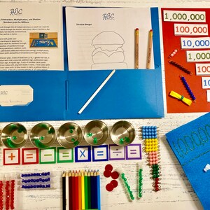 May include: A blue folder with a white pencil and a sheet of paper with a drawing of a hamburger. A red folder with a set of colorful beads and cards with numbers from 10 to 1,000,000. A blue felt board with a grid and the numbers 1000 and 100. A set of colorful beads, metal cups, and math symbols.