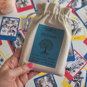 May include: A white canvas bag with a blue label that says "Simply Polyvagal" and has a tree with roots on it. The bag contains 42 cards to help understand the autonomic nervous system.
