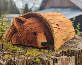 Bear Cub in a log - chainsaw carving