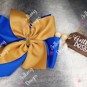Two toned hairbow on clip. Personalize with any two colors.
