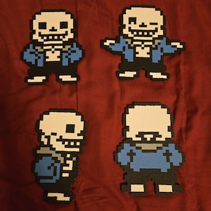 May include: Four pixel art figures of the character Sans from the video game Undertale. Each figure is made of small, colorful beads. The figures are white, blue, and black, and are arranged on a red background.