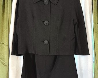 Vintage tweedelig zwart pak uit de jaren 60 met blazer en rok van Friedmont