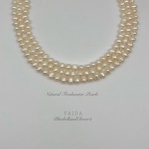 Triple row shop pearl necklace