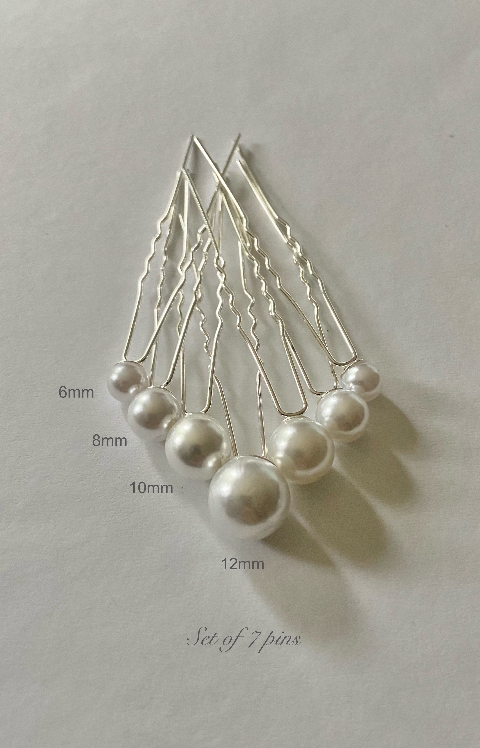 Bobby pins with pearls on the end deals
