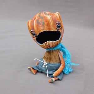 Pumpkin head doll Halloween artwork Pumpkin man