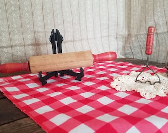 Childs wooden rolling pin and potato masher