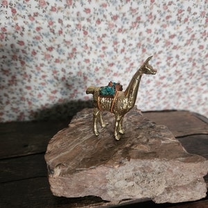 miniature brass alpaca hauling rocks