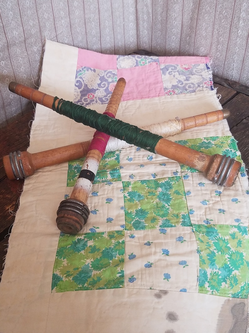 3 vintage wooden bobbin spools
