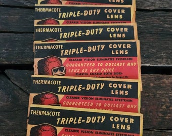 Lot of 7 vintage Thermacote Triple duty cover lenses (welding mask) all in original packaging