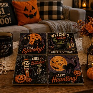 May include: A set of four square coasters featuring Halloween-themed illustrations. The designs include an owl with a full moon, a witch's cauldron with the text Witches Brew, a skeleton in a tuxedo holding a martini, and a black cat with a moon.