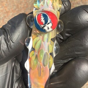 Color changing cigarette tip