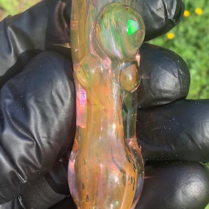 Color changing cigarette tip