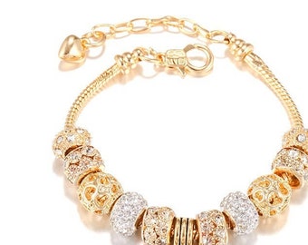 18 gold carat gold plate charm bracelet