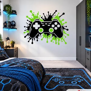 Sticker mural décoratif pour chambre d'enfant ou d'ado, motif éclaboussures de manette de jeu. Accessoires pour configuration de jeu.