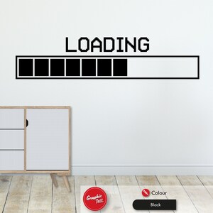 May include: Black and white wall decal with the text "LOADING" and a progress bar. The progress bar is filled with black squares and has a white background.