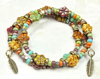 Czech Glass Bead Memory Wire Bracelet with Feather Charms. Adjustable 3-coil, custom orders available.