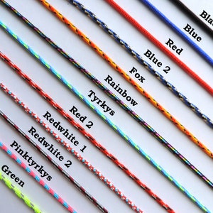 May include: A variety of colorful cords with different patterns and names, including Black, Blue, Red, Blue 2, Fox, Rainbow, Tyrkys, Red 2, Redwhite 1, Redwhite 2, Pinktyrkys, and Green.