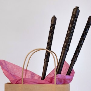 Black rubber coated rattan cane for punishments
