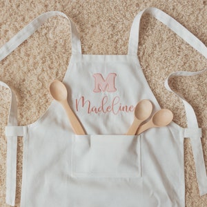 Sizes S.L.XL. Name Embroidered Easter Apron. Personalized Holiday Gifts. Custom Baby Gifts. Mom and Daughter Gifts. Cute Kitchen Apron. image 8