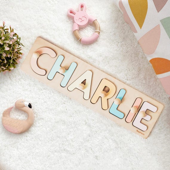 14,000+ favorites on a $19 baby name puzzle — proof this seller has mastered quality, customization, and value in one of Etsy's most competitive gift niches.