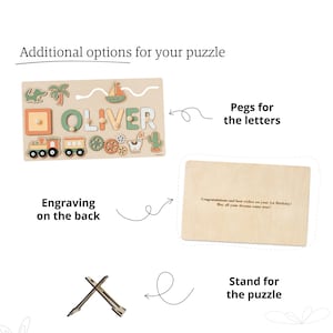 May include: A wooden puzzle board with the name OLIVER, featuring pegs for letters, a train, boat, and cactus shapes. Includes a back panel with the engraving: Congratulations and best wishes on your 1st Birthday! May all your dreams come true! Also includes a wooden stand.