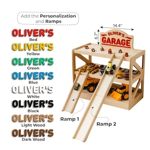 May include: A wooden toy garage with two levels, two ramps, and a sign reading OLIVER'S GARAGE. The sign measures 14.4 inches wide by 6.7 inches high. A list of color options for the name personalization is shown in red, yellow, green, blue, white, black, light wood, and dark wood.