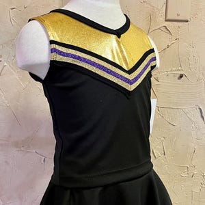 Mädchen jubeln Outfit Schwarz Lila Gold in verschiedenen Größen erhältlich