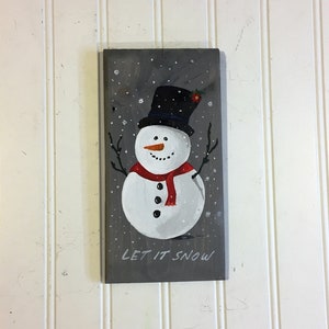 LET IT SNOW - Segno del pupazzo di neve.  Dipinto a mano su un&#39;asse di legno.