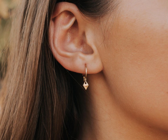 Dainty gold hoop earrings deals