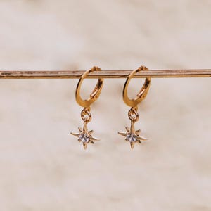 Star Hoop Earrings, 14k Gold Filled, Celestial Earrings, North Star Earrings, Starburst Huggie Earrings, Huggie Earrings with Charm