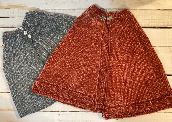 Soft orange cable capelet and gray capelet