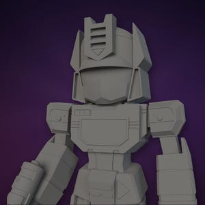 May include: A gray, unpainted 3D printed bust of a robotic figure. The figure features a blocky, angular design with a prominent helmet, a visor-like face plate, a rectangular chest piece, and mechanical arm details in a stylized, geometric form.