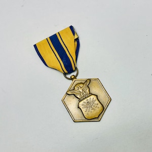 Vintage United States Air Force Commendation Medal for heroism, meritorious achievement, or meritorious service.