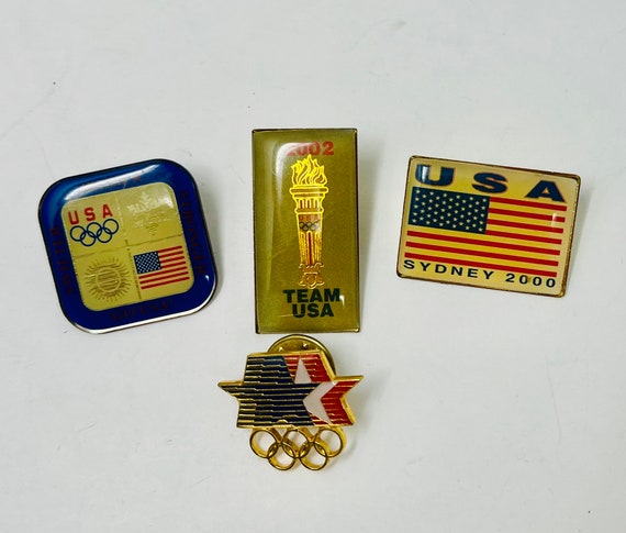 Vintage Olympic pins collection of four lapel pin… - image 1