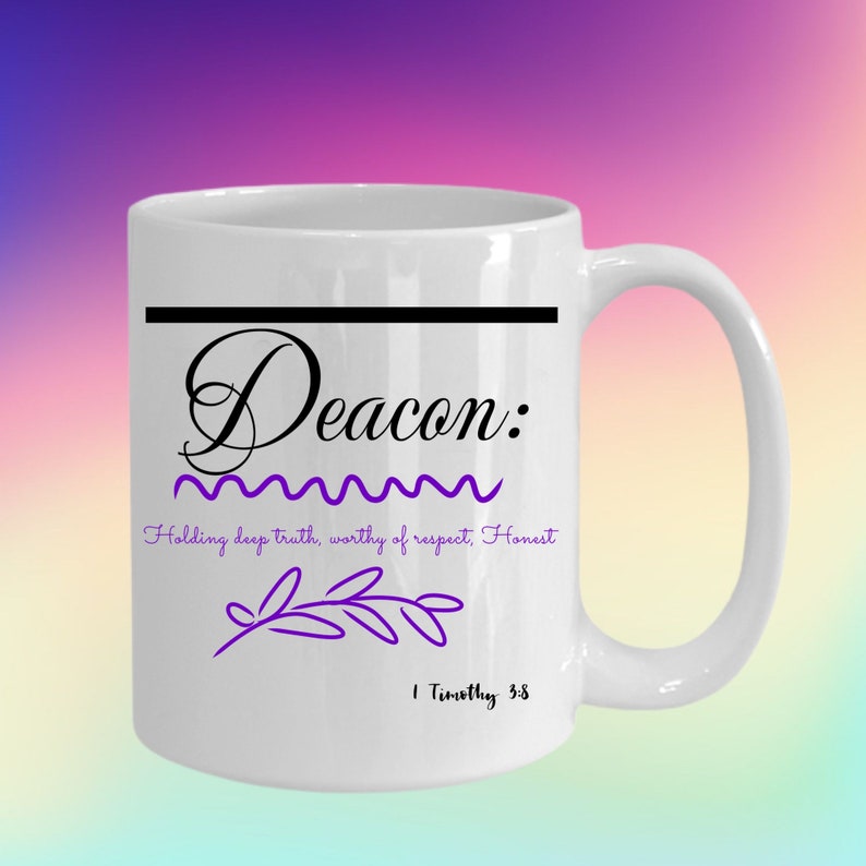 May include: White ceramic mug with a black line across the top and the word "Deacon" in black cursive lettering. The text "Holding deep truth, worthy of respect, Honest" is in black lettering below the word "Deacon". A purple branch design is below the text. The text "1 Timothy 3:8" is in black lettering below the branch design.