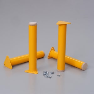 May include: Four yellow metal table legs with triangular bases and wooden tops. The legs are arranged in a semi-circle with screws scattered in front of them.