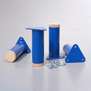 May include: Four blue metal furniture legs with a triangular base and a wooden top. The legs are approximately 6 inches tall. The set includes screws for attaching the legs to furniture.