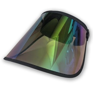 May include: A clear visor with a black band. The visor has a gradient of colours, including green, purple, and yellow. The visor is designed to shield the eyes from the sun.