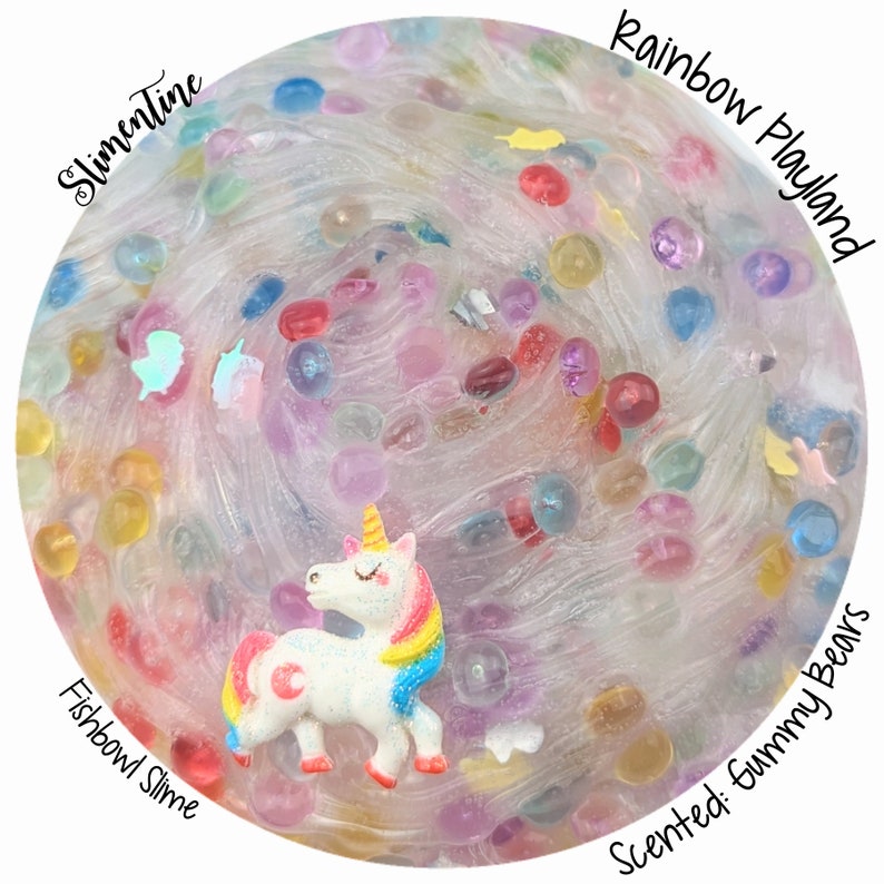 May include: Clear slime with rainbow colored beads and a white unicorn charm. The slime is labeled "Fishbowl Slime" and "Rainbow Playland". The slime is scented with "Gummy Bears".